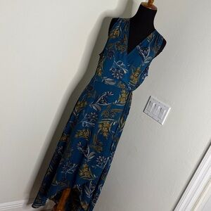 ALLISON JOY sleeveless high-low wrap dress in teal blue with a floral pattern M